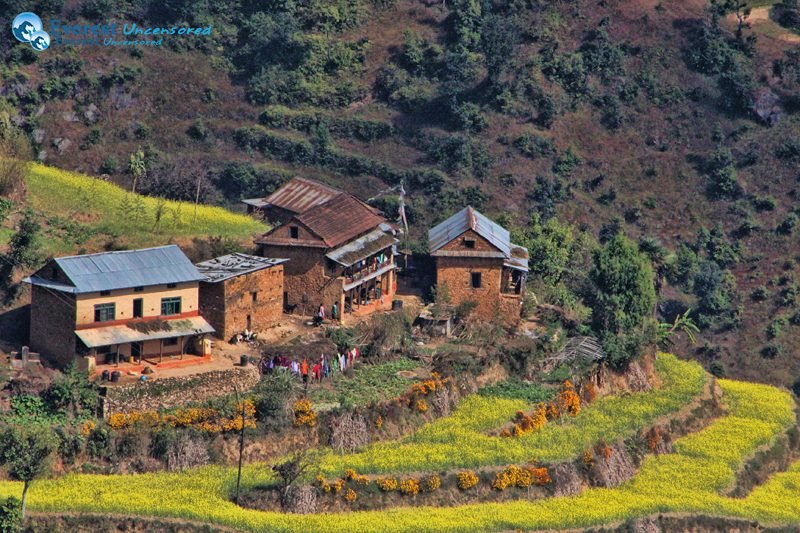 things to do in lakuri Bhanjyang- beautiful scene of mountain, terrace, and house