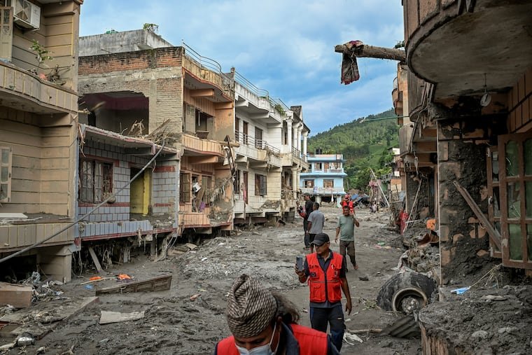 Nepal flood damaged houses and infrastructure