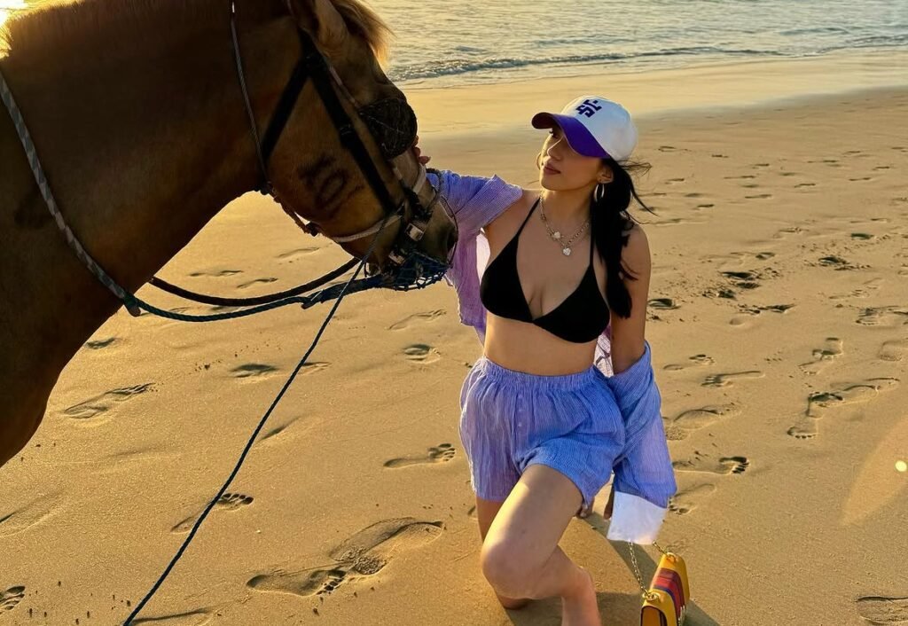 Anna Sharma in bikini photo with horse