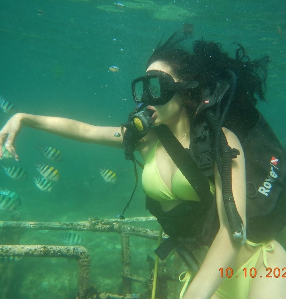 Anna Sharma scuba diving in bikini