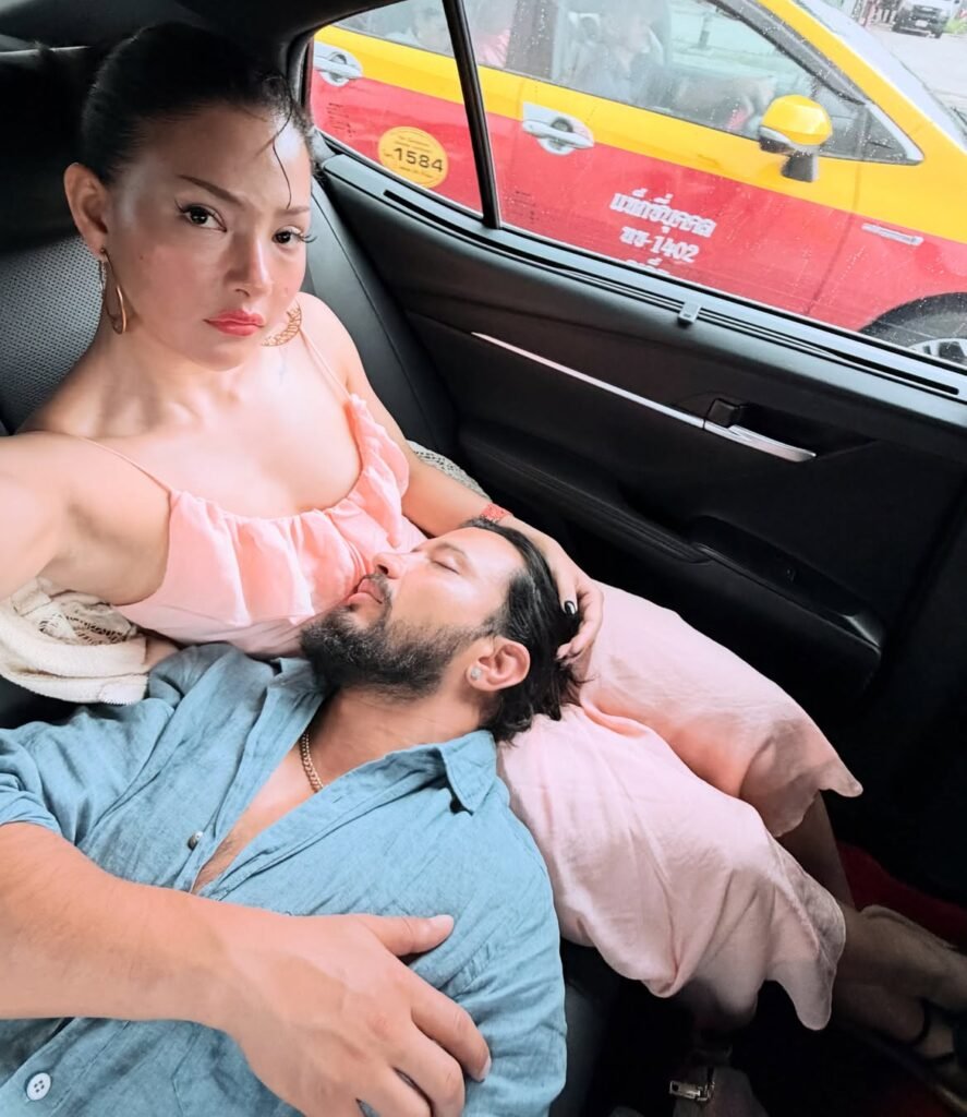 Bishal sleeping in Samragyee's lap in taxi