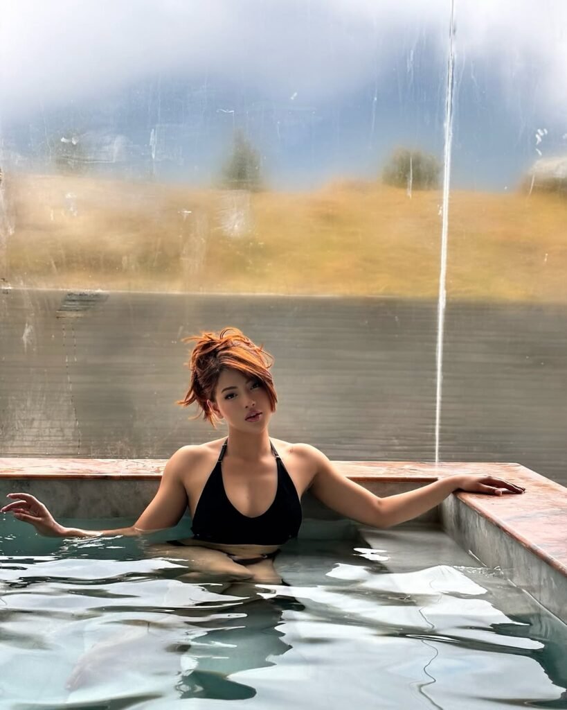 Samragyee laxmi shah in black bikini at pool drinking (1)