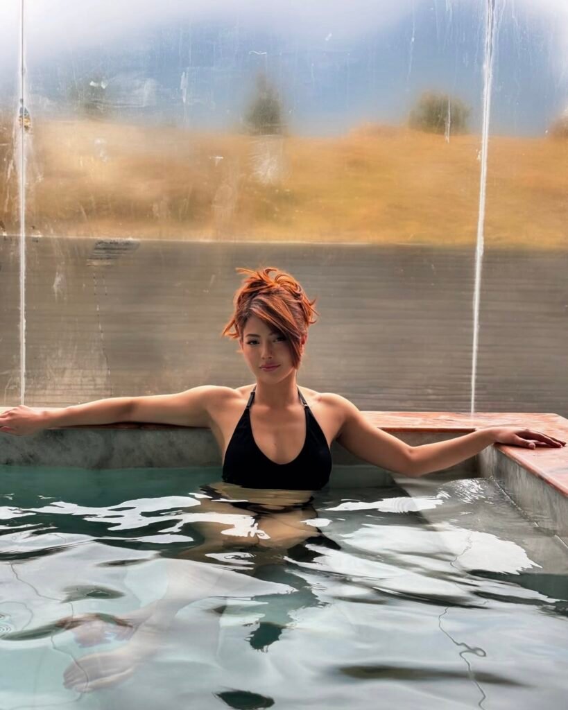 Samragyee laxmi shah in black bikini at pool drinking (2)