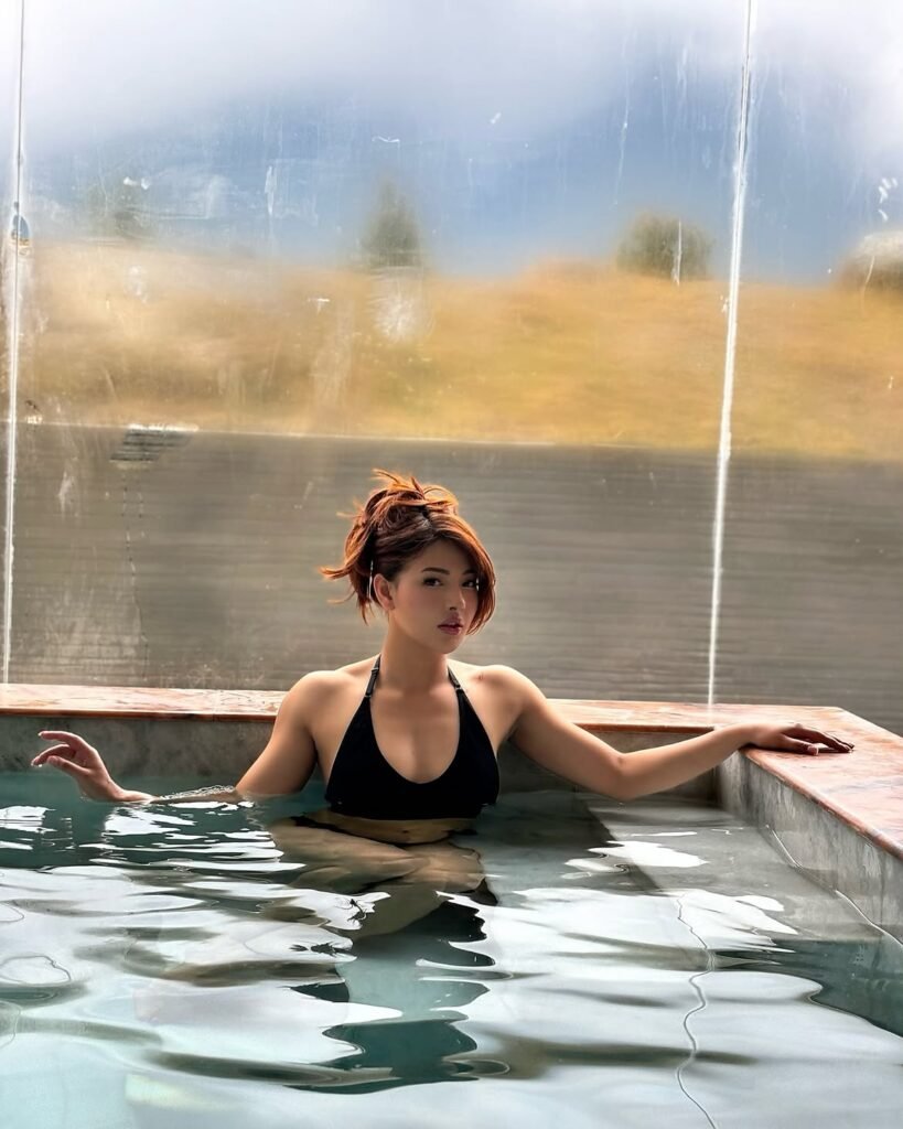 Samragyee laxmi shah in black bikini at pool drinking (5)